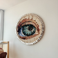 textil tejido en forma de ojo